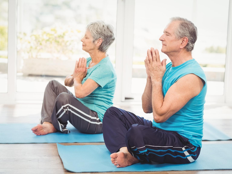 Couple practicing yoga