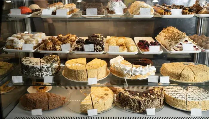 pies and baked goods in a display case for purchase