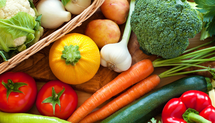 An assortment of colorful raw vegetables. 