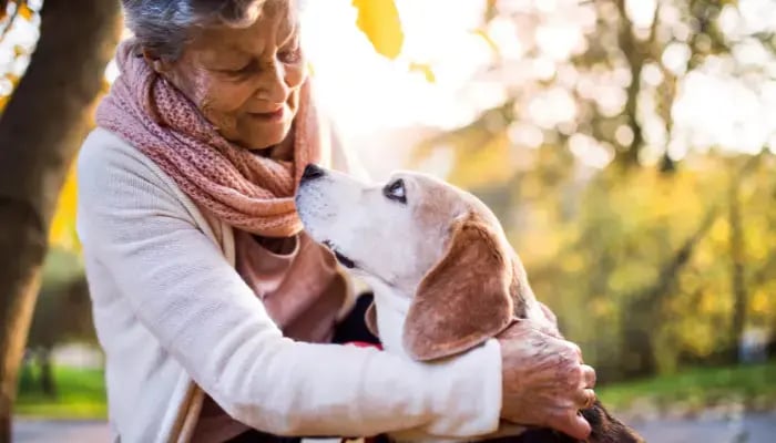 Senior woman with her dog