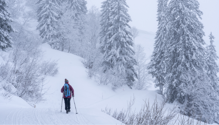 Senior woman on a winter mountain getaway in the Catskills